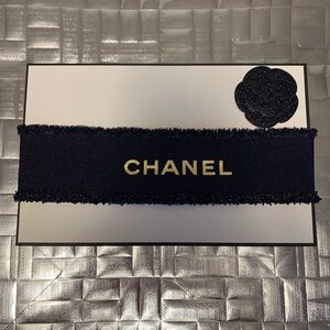 CHANEL Navy Ribbon with Gold Logo Accent